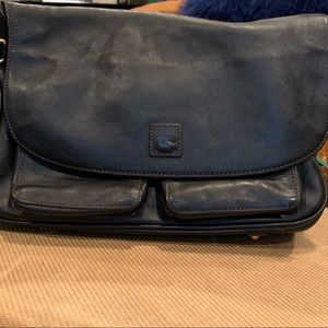 Lovely Dooney and Bourke black leather purse.